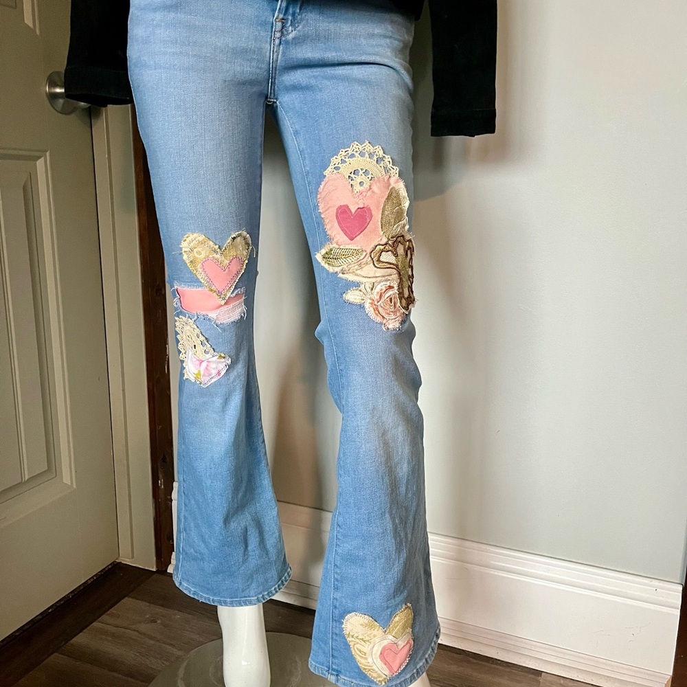 Levi's Light Blue Flare Jeans with Pink Heart Patches